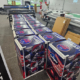 Several bar fridges wrapped in Cooper Tires branding