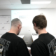 Production team discussing print job