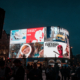 A display in a city centre with digital screens