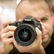 Person taking a photo with a Canon camera