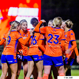 Lions FC Women's team celebrating a goal